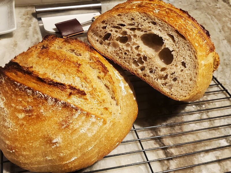 A loaf cut open beside its other half